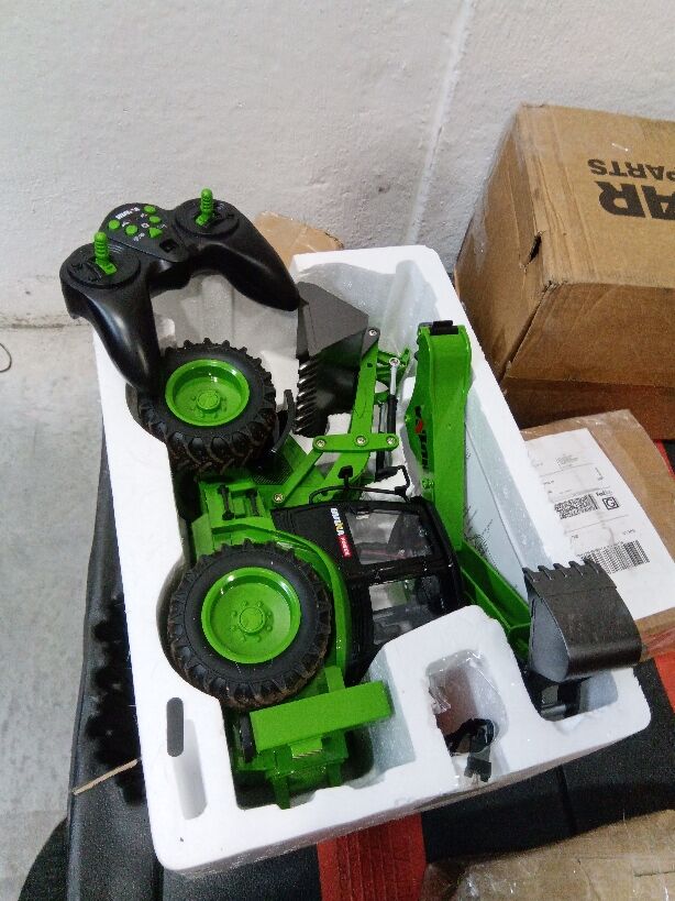 Fast Free Shipping Second Hand US Stock HUINA 1/14 1579 Remote Control Backhoe Excavator Multifunctional Loader with 2.4G Radio Controller Sound Light