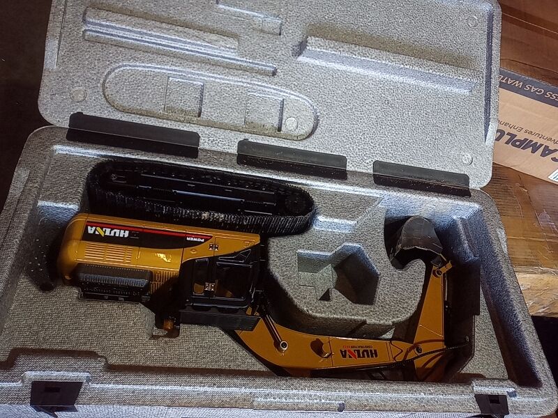 Fast Free Shipping Second Hand US Stock HUINA New Upgrade 580 1/14 Metal Excavator Model Engineering Vehicle Electric Ball Grabber 360 Rotating Shear Claw Sound Lights
